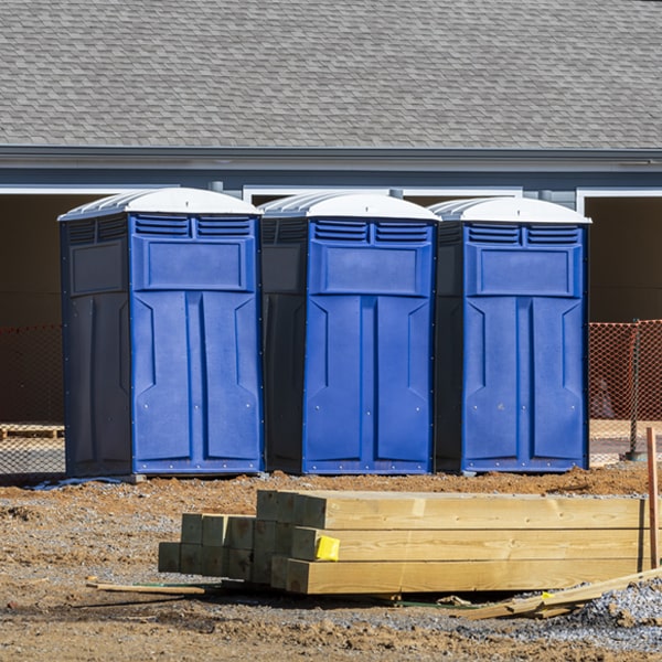 what is the cost difference between standard and deluxe porta potty rentals in Medford Oregon